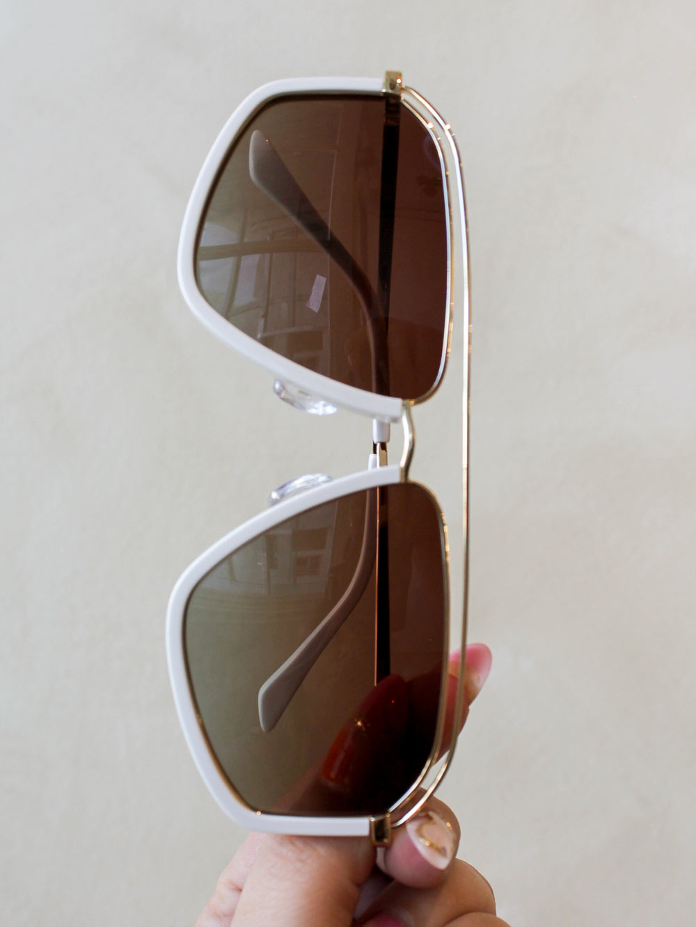 Eleventh Hour 11.3 oversized aviator sunglasses with a white frame and brown gradient lens