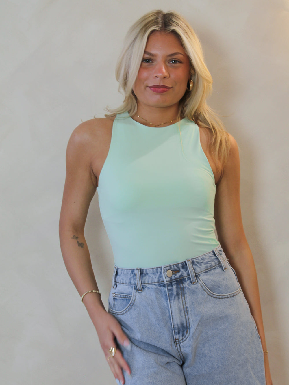 STEVE MADDEN SMOOTH AND SLEEK SLEEVELESS BODYSUIT IN MINT
