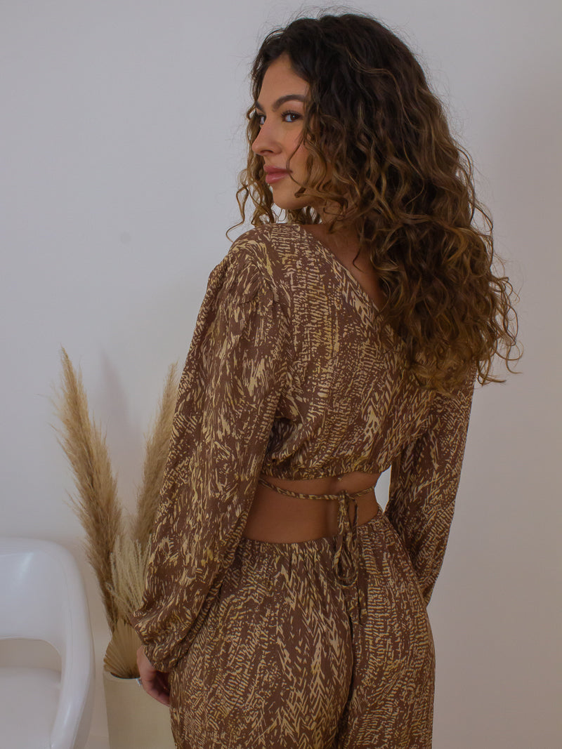 BROWN PATTERN JUMPSUIT WITH TIE DETAIL