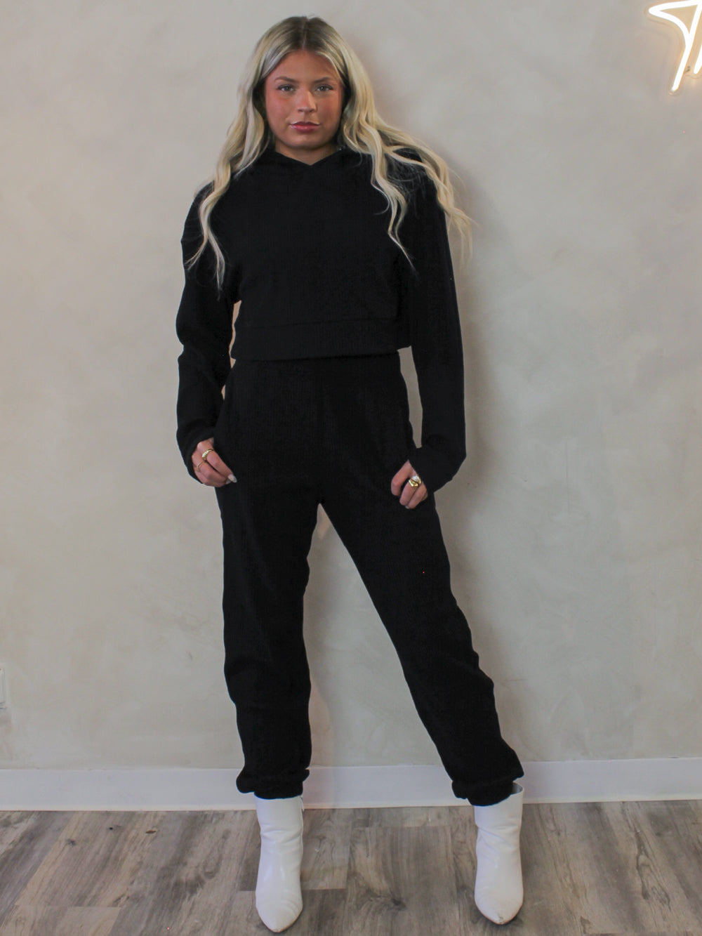 All black, ribbed lounge set with matching hooded top and pants