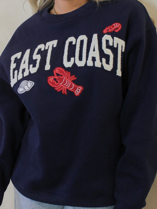 Navy blue sweatshirt with 'East Coast' text and lobster graphics