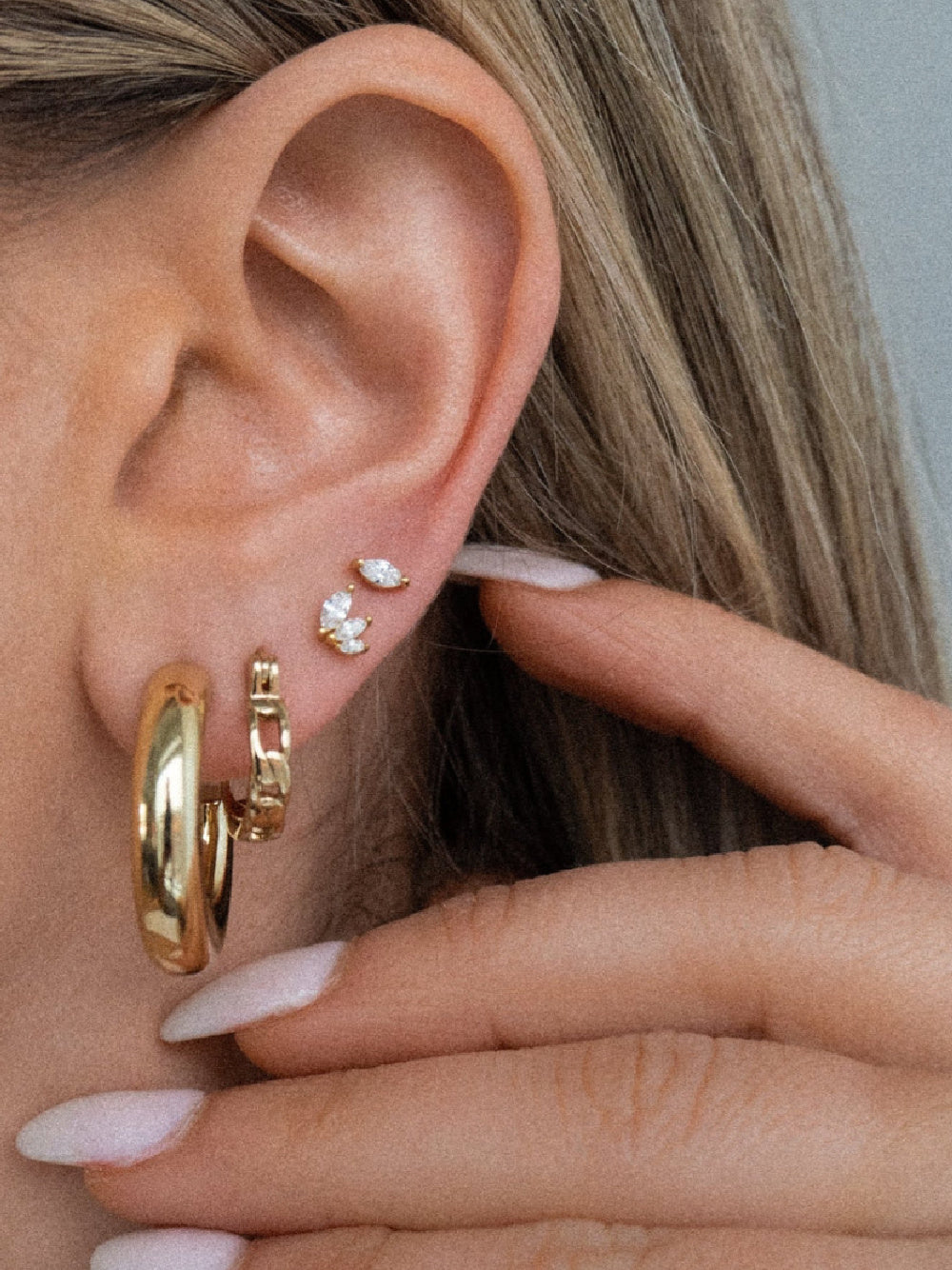 Cool gold earring stacks