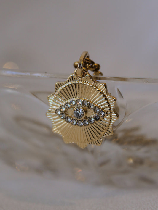 Gold evil eye charm necklace