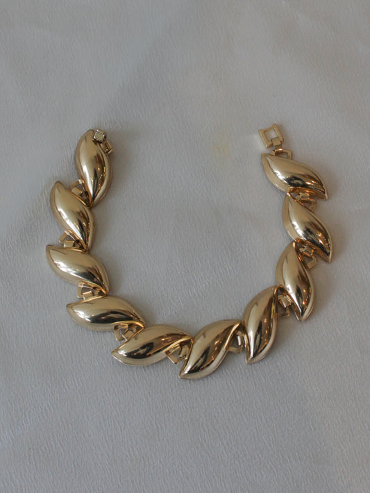 Gold statement bracelet with curved links