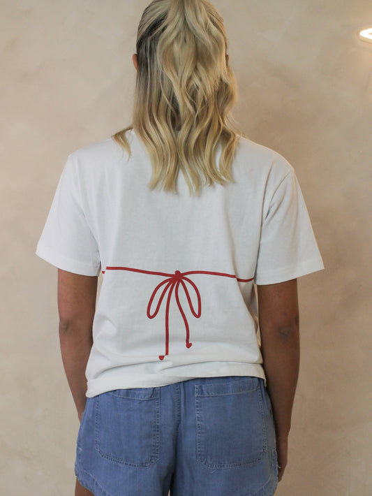 Back view of a bikini tee with a tied graphic