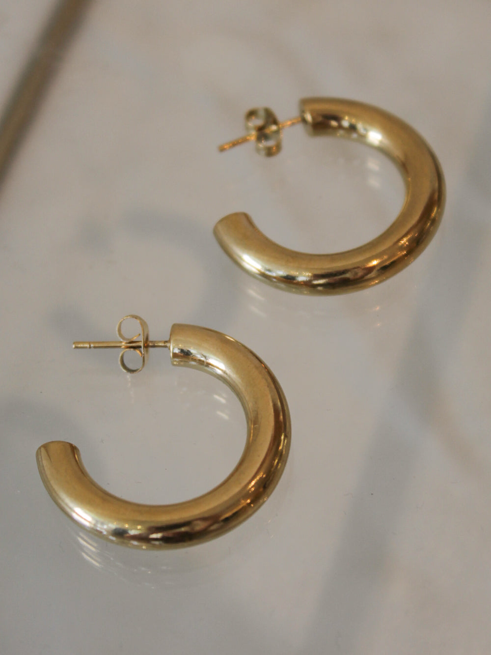 Medium gold chunky hoop earrings