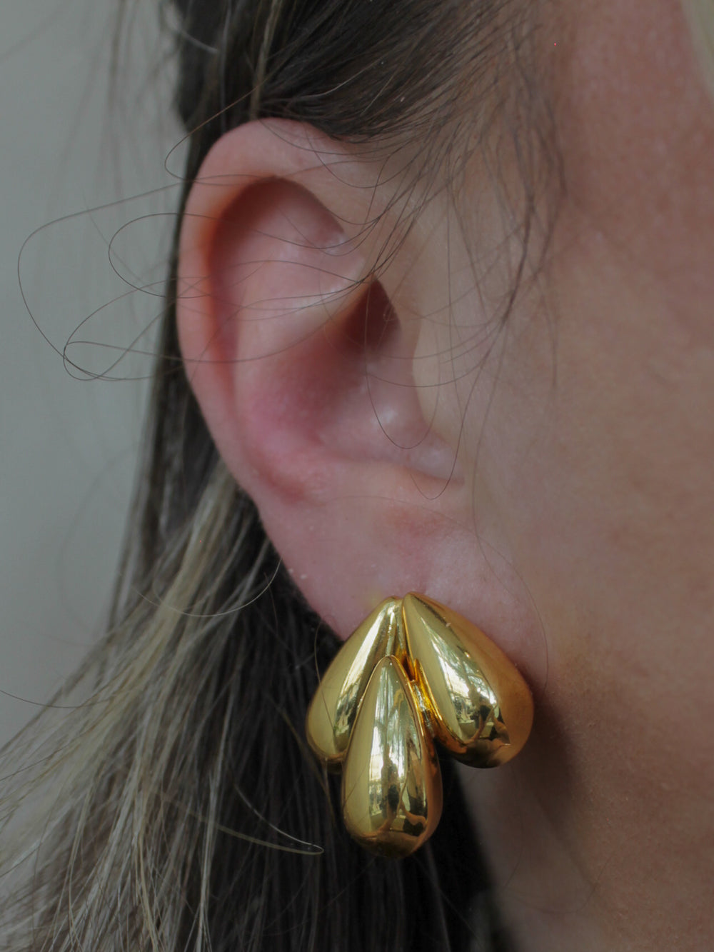 Gold teardrop statement earring