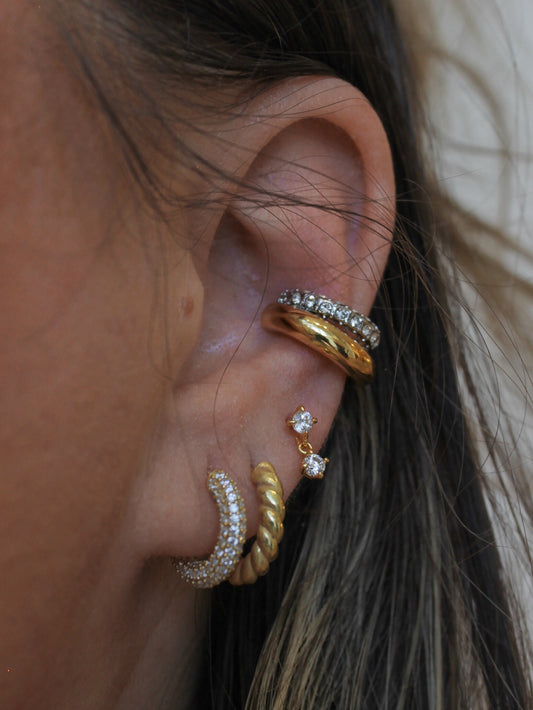 Gold earring stack with small hoops and ear cuffs