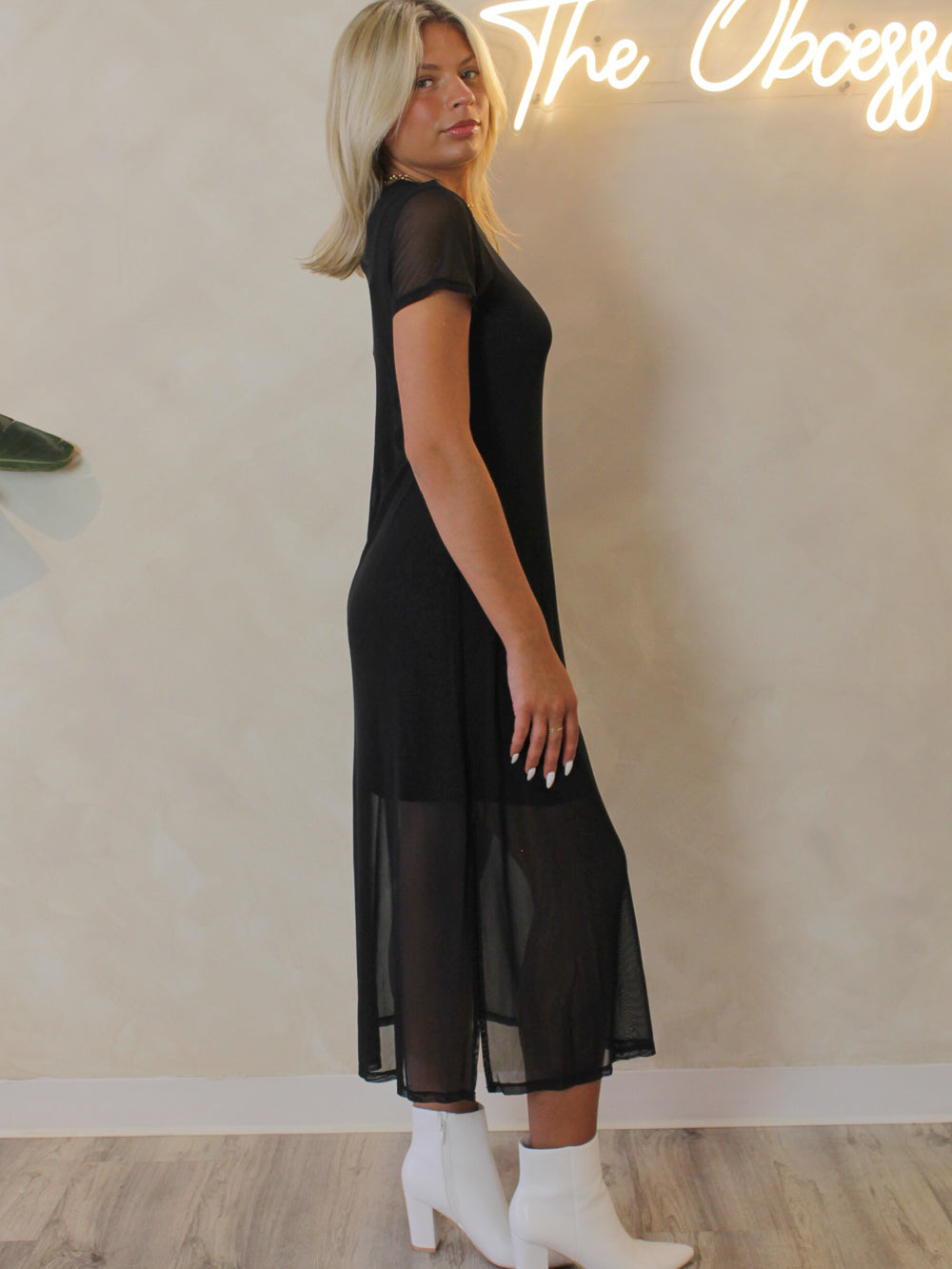 Side view of the Steve Madden Nola mesh midi dress with sheer overlay and slip underneath