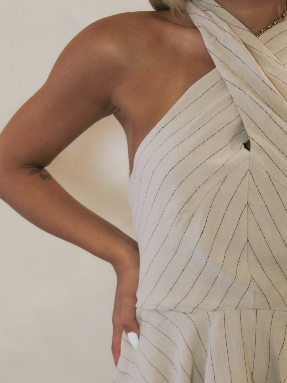 Beige, linen cross halter top with pinstripe detail by Steve Madden