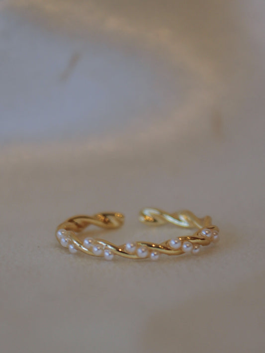Dainty gold ring with pearl accents