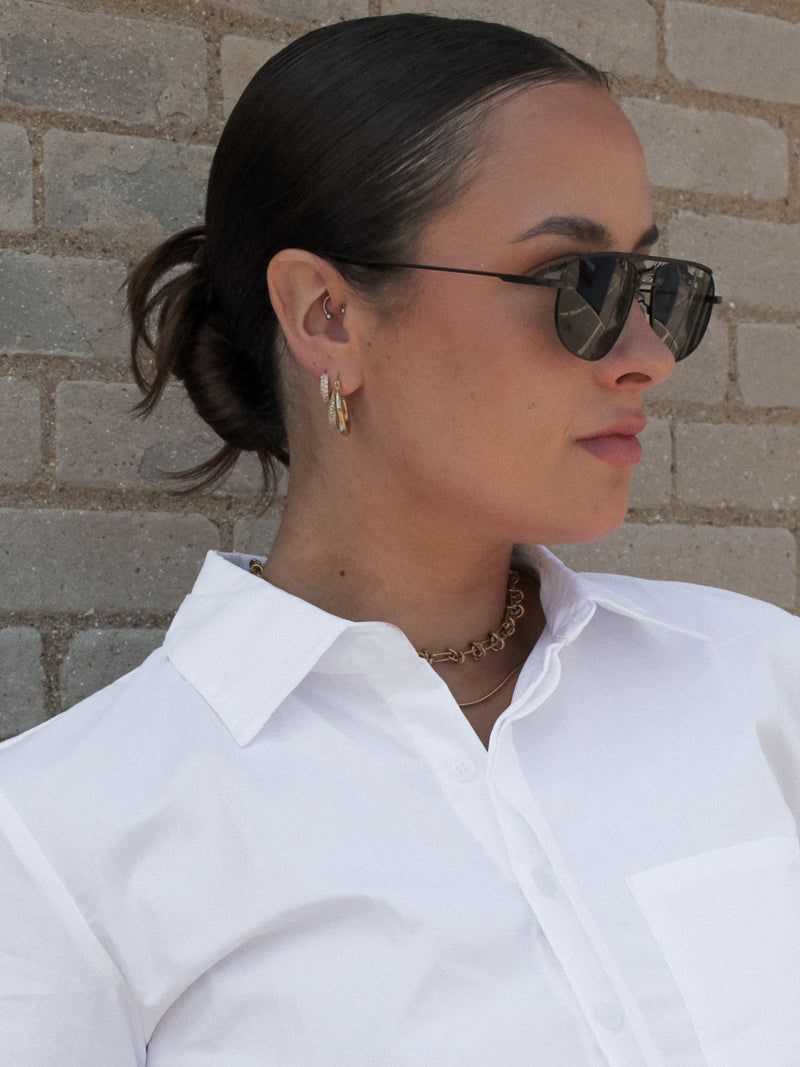 Girl wearing Black Frame & Black Lens Sunglasses
