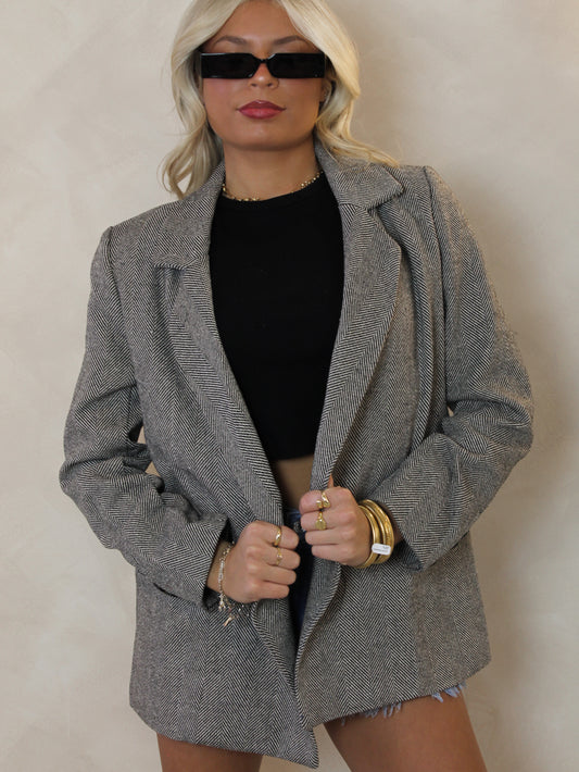 Womens grey structured blazer with single button closure