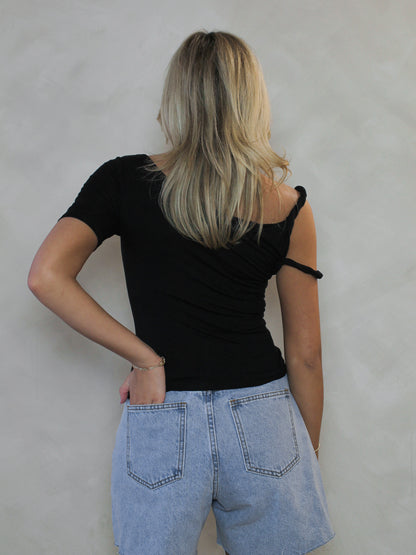 BLACK TEE WITH ASYMMETRIC SLEEVES