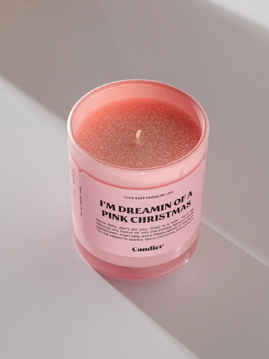 Pink Christmas candle topped with pink glitter