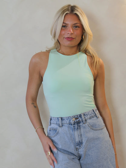STEVE MADDEN SMOOTH AND SLEEK SLEEVELESS BODYSUIT IN MINT
