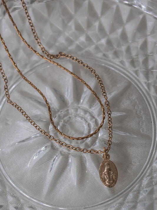 Gold Double Layered Necklace with Saint Charm 