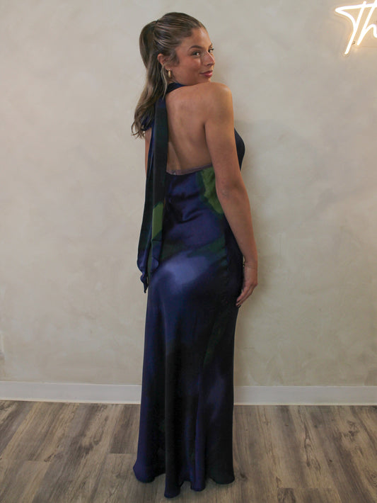 Navy maxi dress with a tie halter neckline for wedding guests and special occasions.