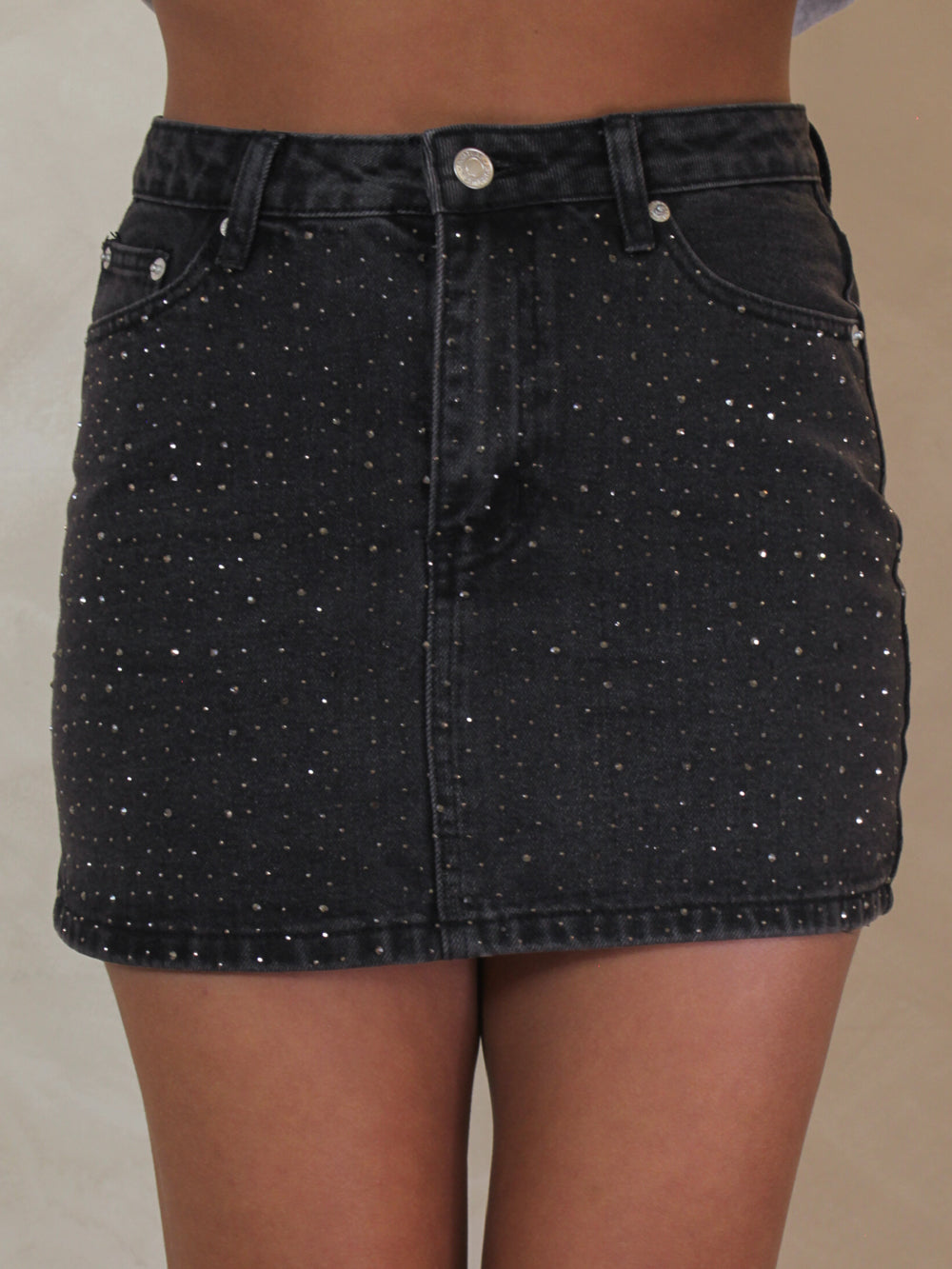 Black, denim, rhinestone mini skirt.