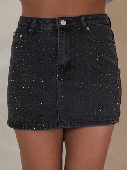 Black, denim, rhinestone mini skirt.
