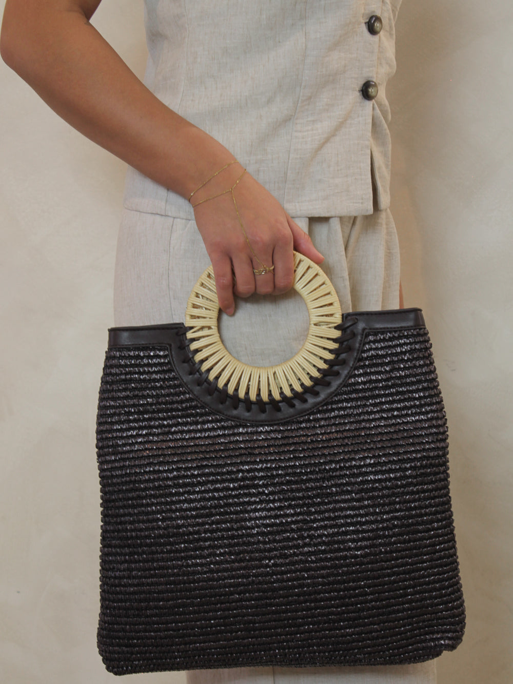 Chocolate brown woven hand bag for spring and summer 
