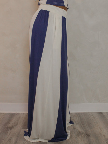 Side view of blue and cream striped pants.