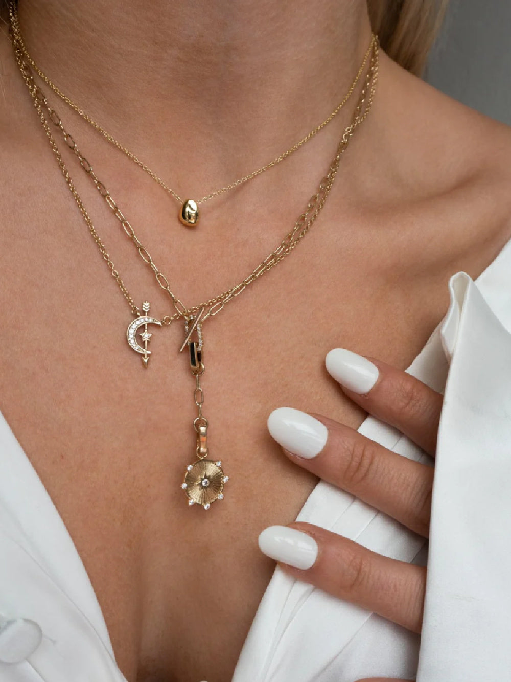five and two Gold Necklaces 