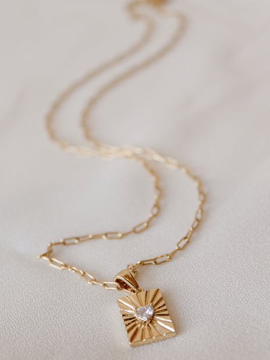 Gold heart card pendant necklace 
