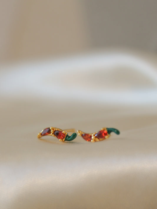 a pair of tiny chili pepper studs for women