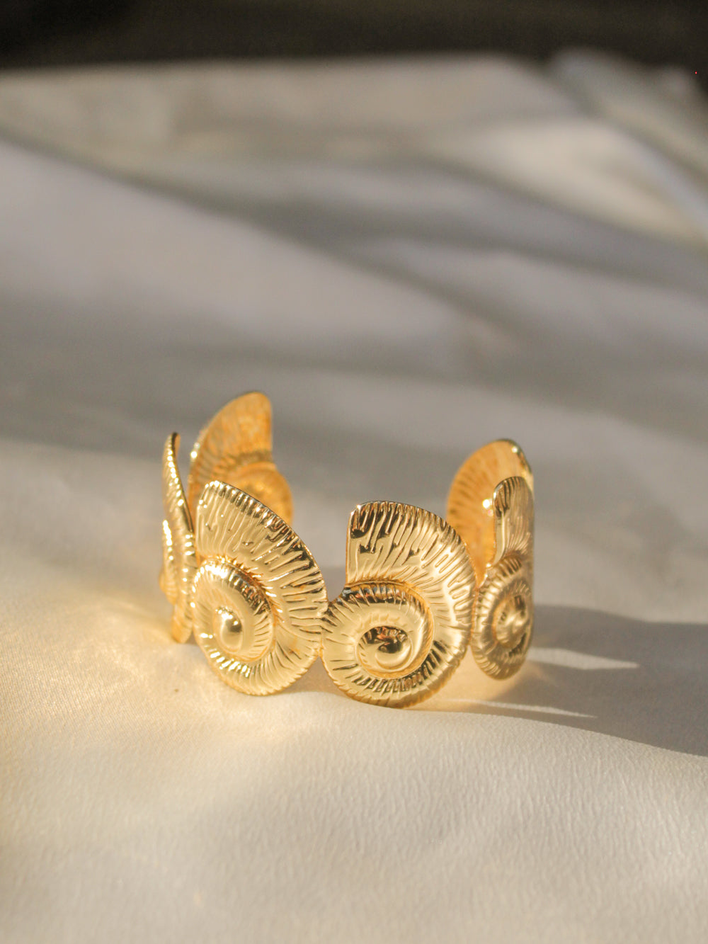 Golden shell cuff bracelet