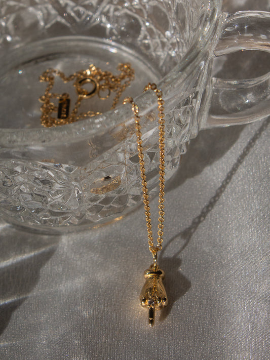 Gold Middle Finger Charm Necklace by JLA