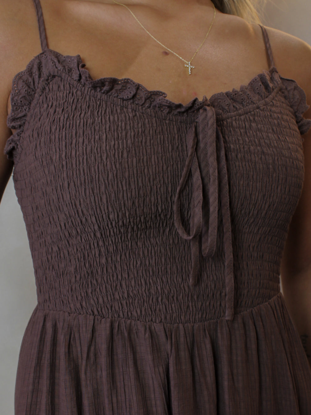 Smocked bust, brown dress