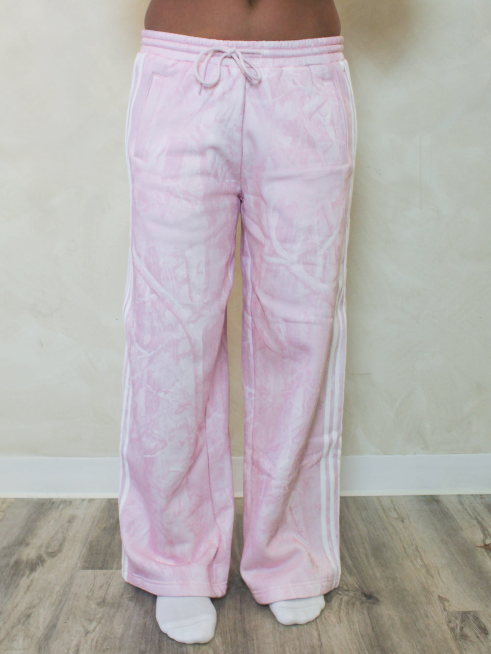 Pink camo sweatpants with white stripes 