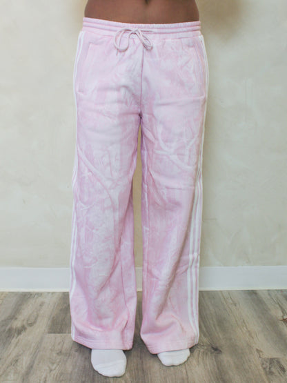 Pink camo sweatpants with white stripes 