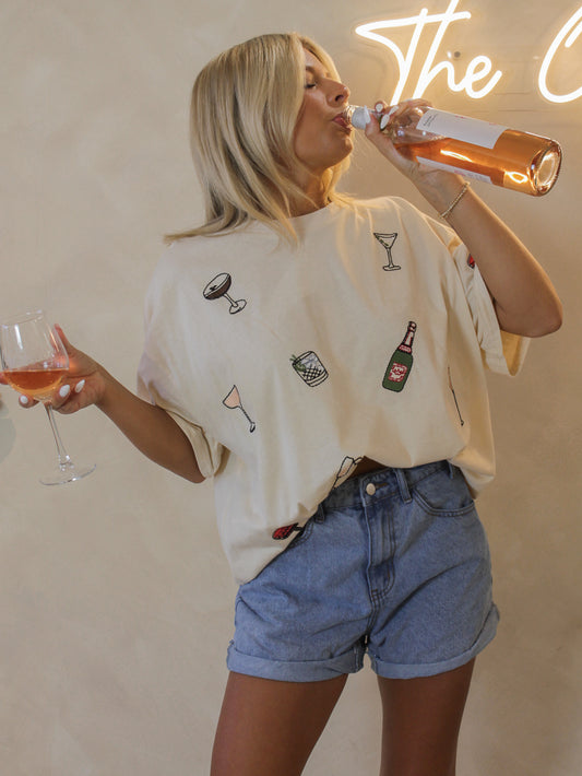 Oversized cream tee with embroidered cocktails all over