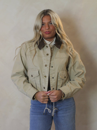 Model wearing a barn style jacket for women 
