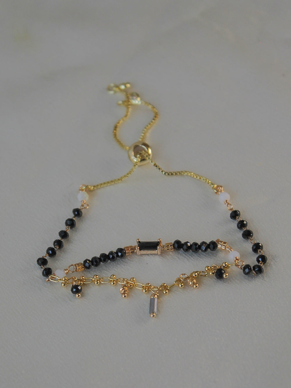 Gold and black beaded bracelet 