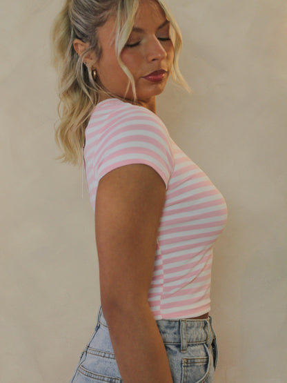 Side view of a pink and white striped top
