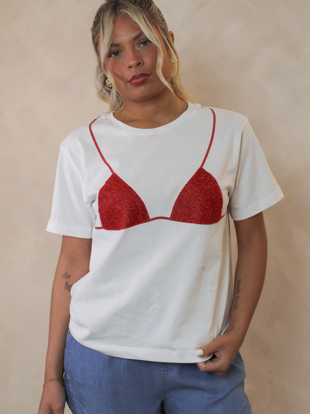 White, relaxed tee with a red bikini graphic