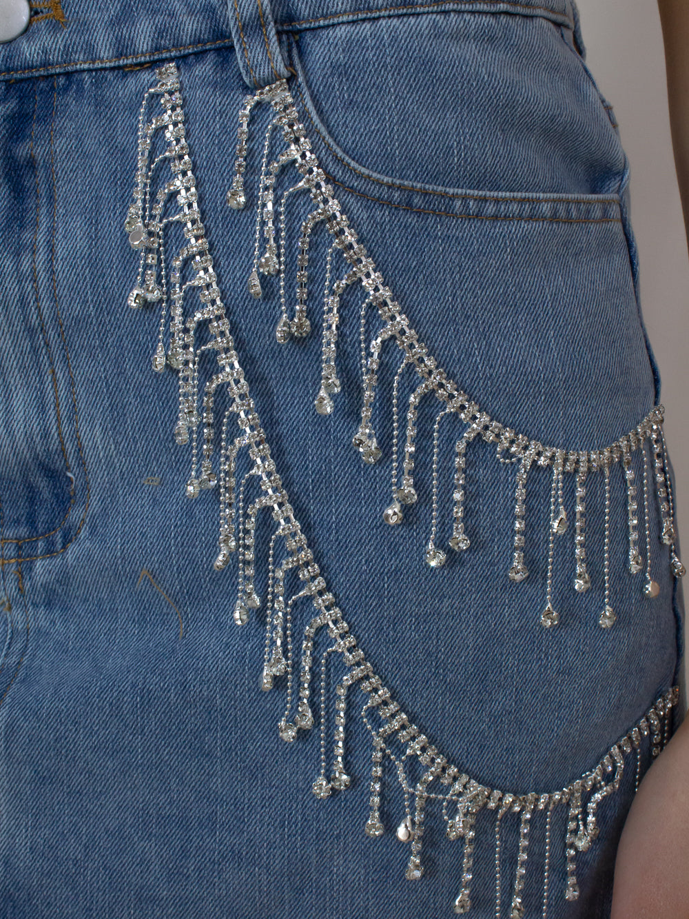 Denim mini Skirt with sparkling rhinestone fringe