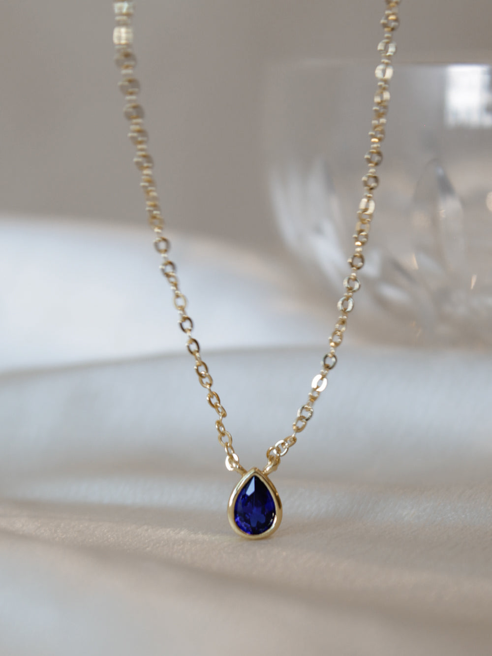 Sapphire tear drop charm necklace 