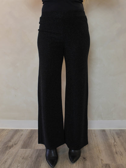 Front view of a pair of black pull on pants with shimmer detail 