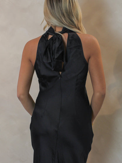 Back detail of black halter neckline dress