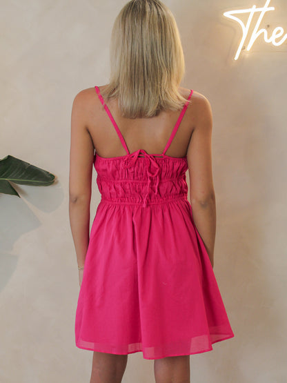 Fuschia pink, fit and flare short dress with adjustable tie back