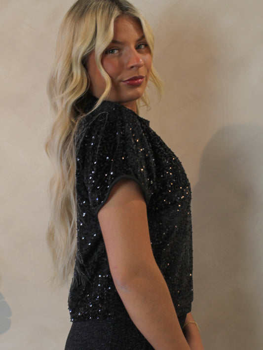 Short sleeve black sequin top for the holidays 