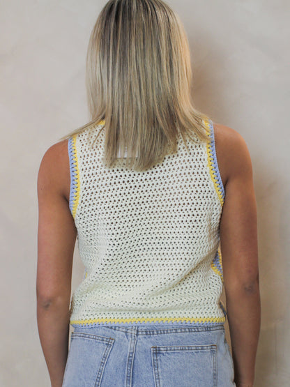back view of a yellow, knit tank for women
