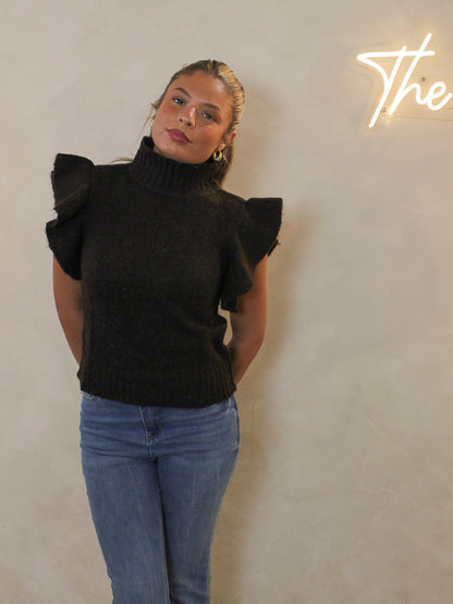 Chocolate brown ribbed sweater with a mock neck and dramatic ruffle cap sleeves.