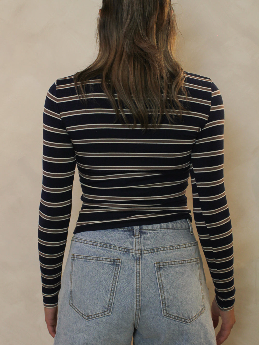 Back view of navy and chocolate striped scoop neck top 