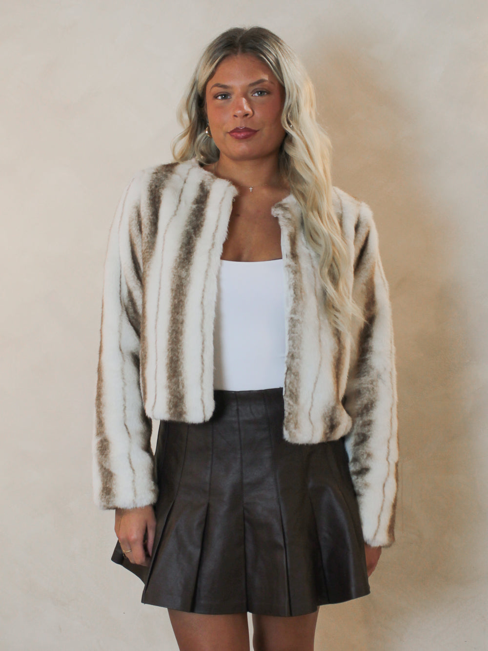 Chic, cream and brown faux fur jacket for women