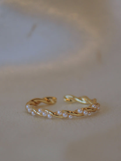 Dainty gold ring with pearl accents 